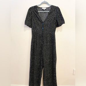 Black polka dot button short sleeve jumper / romper